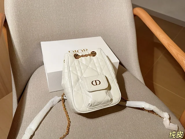 Dior Caro backpack in white Macrocannage lambskin with antique gold-finish metal details