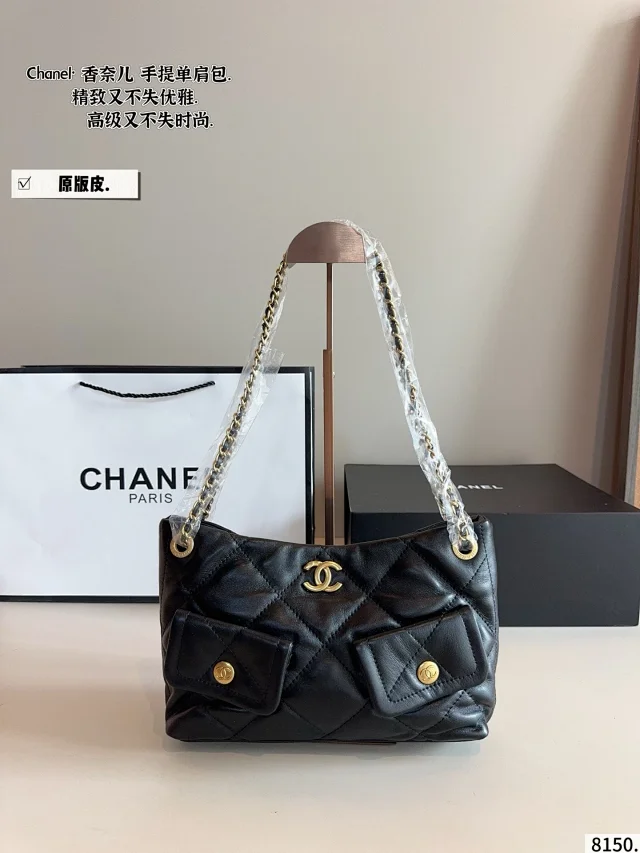 Chanel 25 Hobo bag in black suede with gold-tone hardware