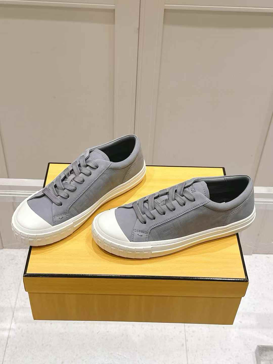 Fendi Domino low-top sneakers in blue suede with a white rubber toe cap and sole