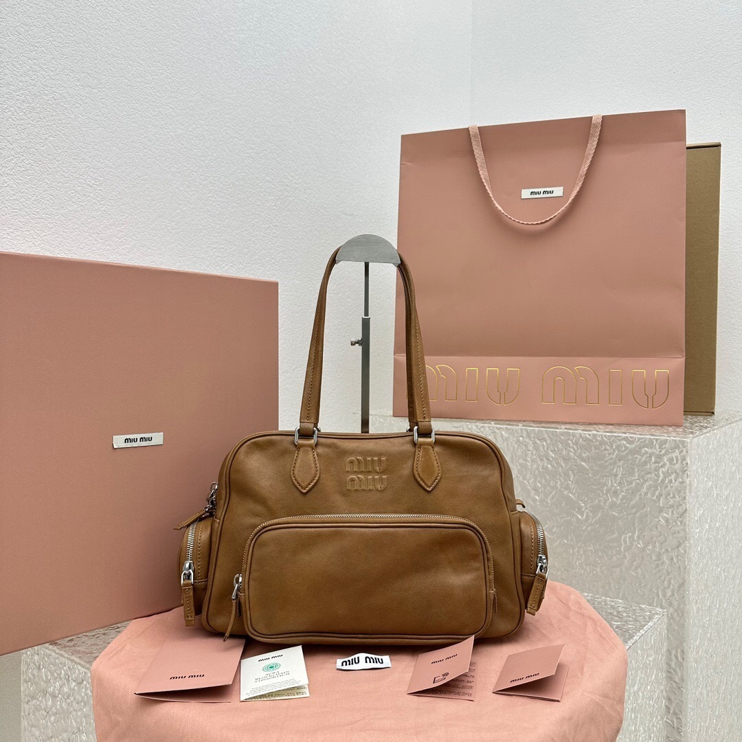 Miu Miu Pocket leather zipped tote bag in brown