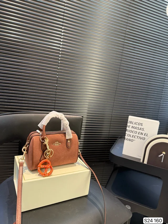 Coach Mini Rowan Crossbody Bag in Vintage Brown suede and smooth leather.