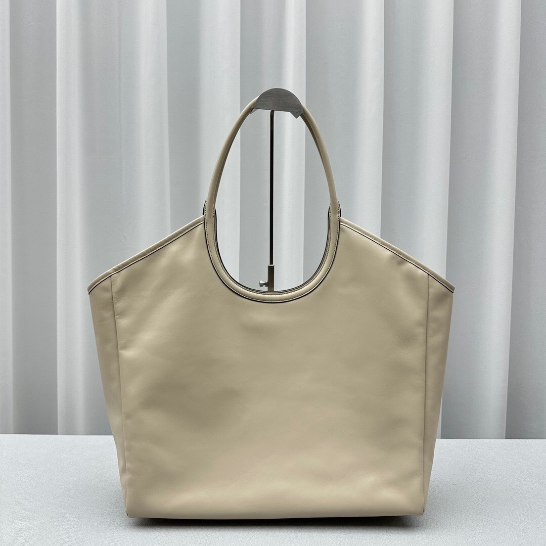 Miu Miu Ivy leather tote bag in a beige or light-colored leather