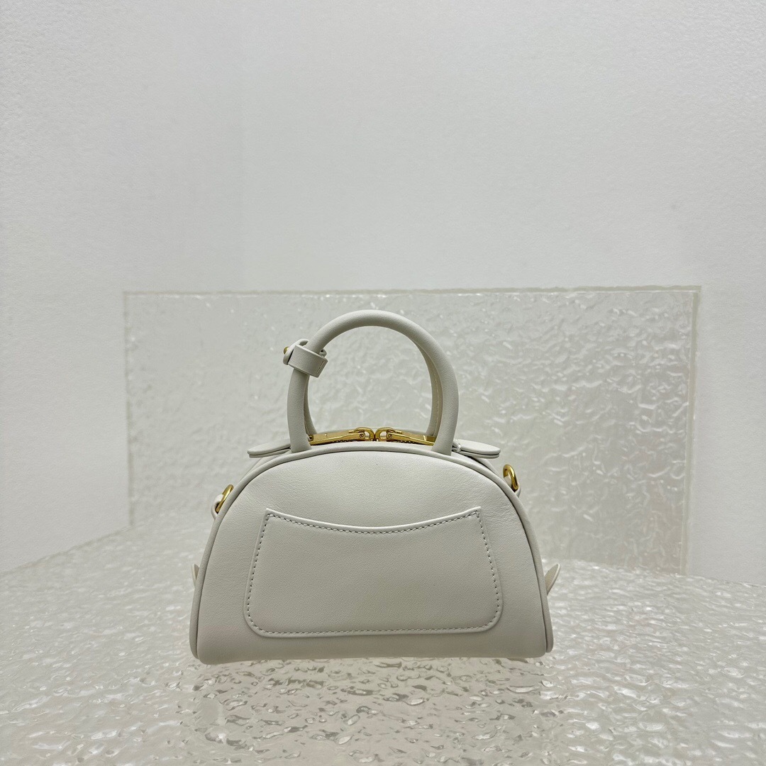 Miu Miu leather top-handle bag in chalk white with gold-tone hardware