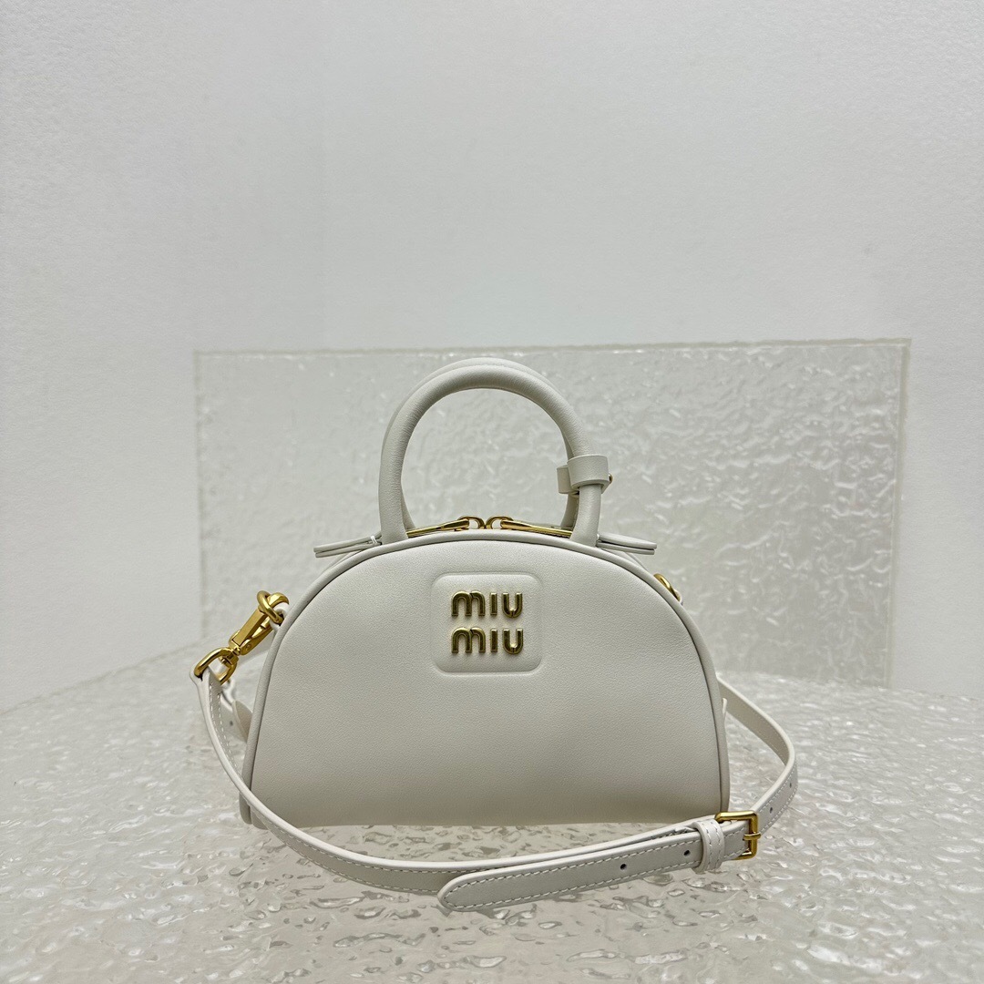 Miu Miu leather top-handle bag in chalk white with gold-tone hardware