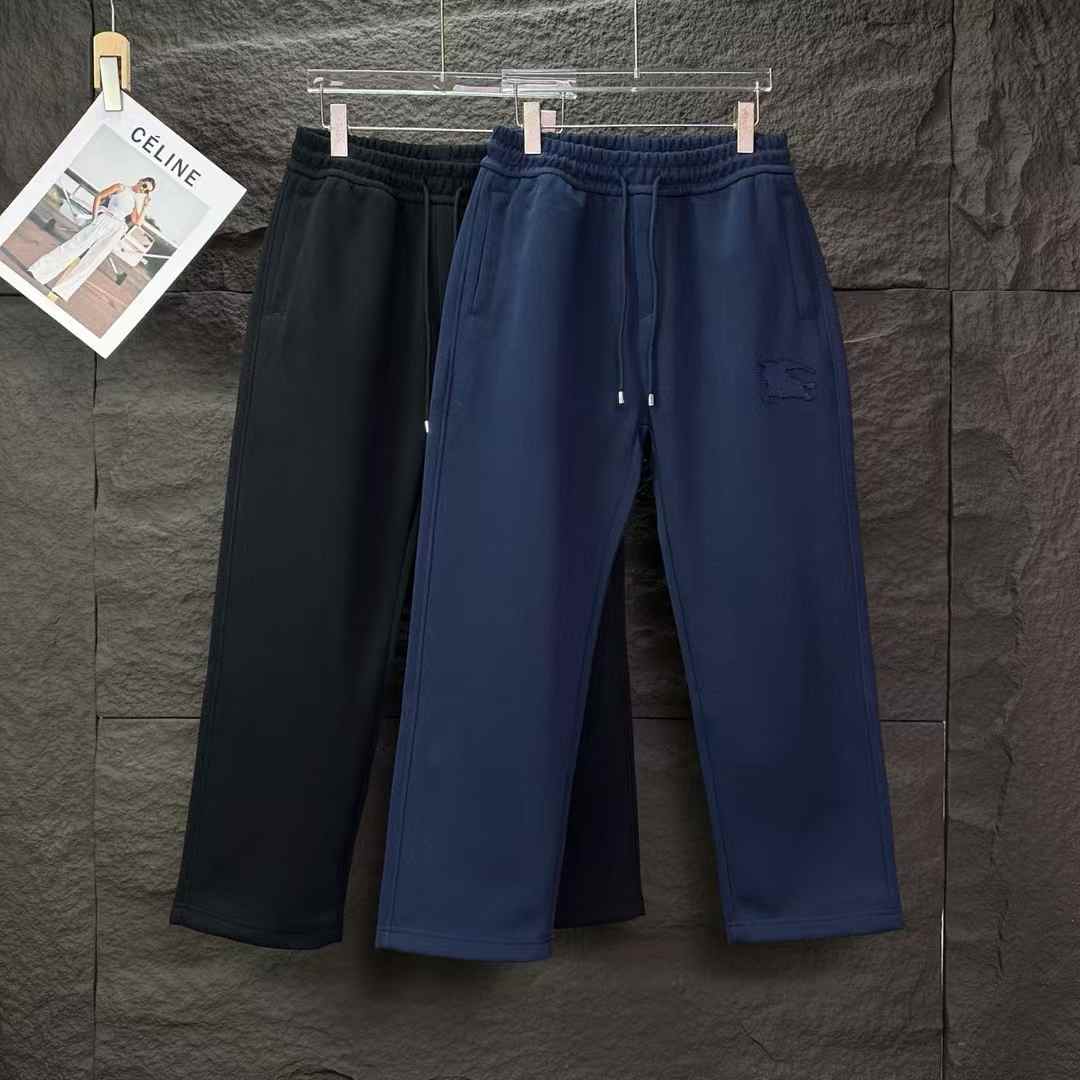 Burberry EKD-embroidered cotton track pants in black