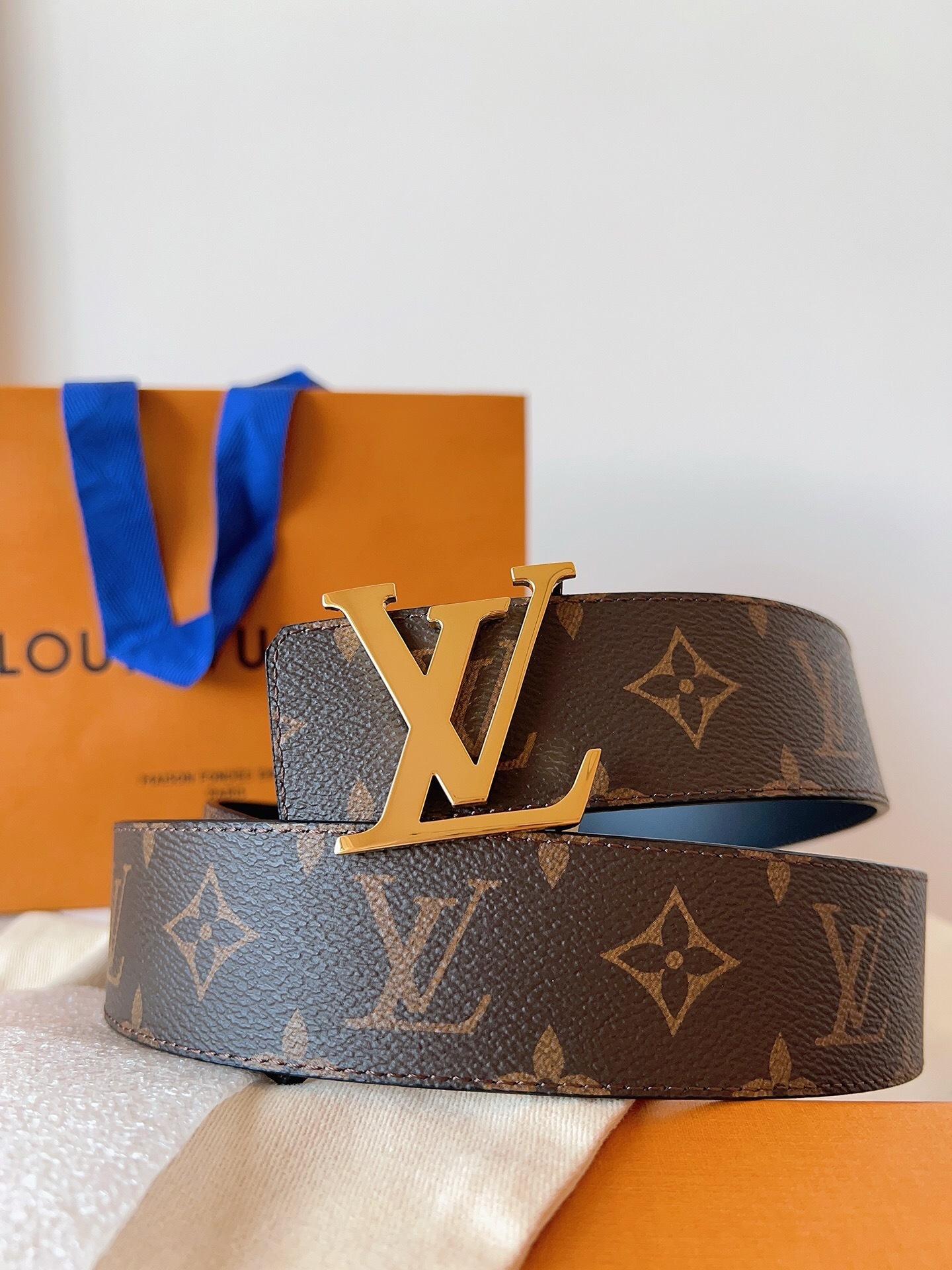 LV monogram canvas gold-colored LV buckle