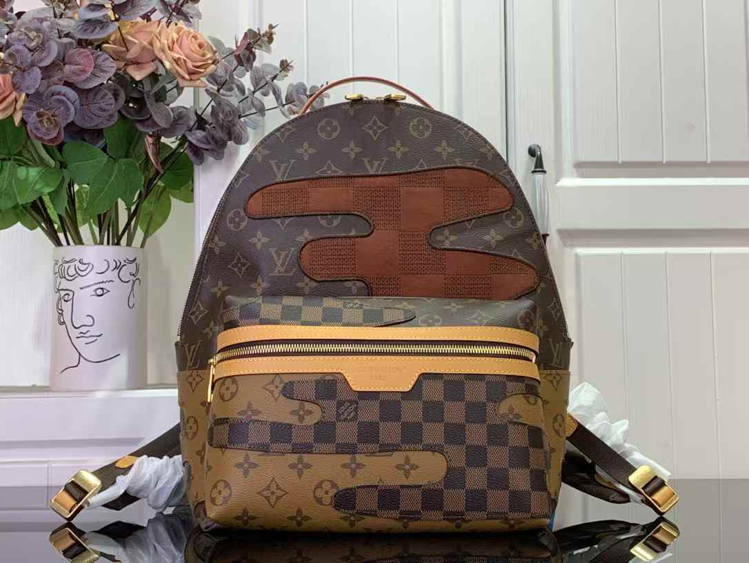 LV Discovery Backpack PM in Monogram canvas, featuring patches of Monogram Reverse and Damier canvas