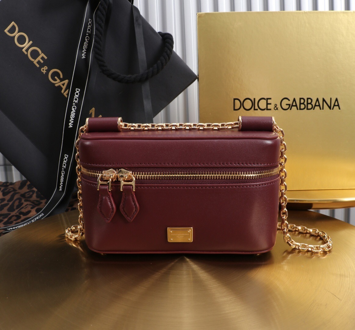 Dolce & Gabbana Sicily crossbody bag in a burgundy / plum color