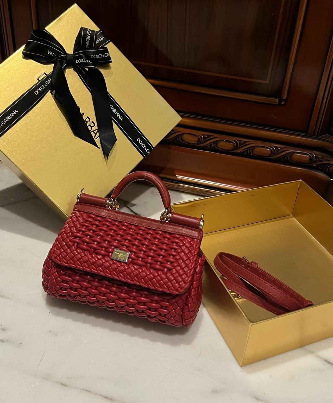 Dolce & Gabbana small Sicily handbag in a red interwoven lambskin or woven leather design