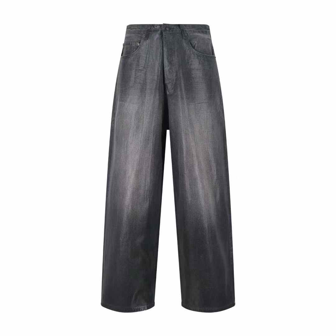 Balenciaga wide-leg jeans with a metallic or reflective finish