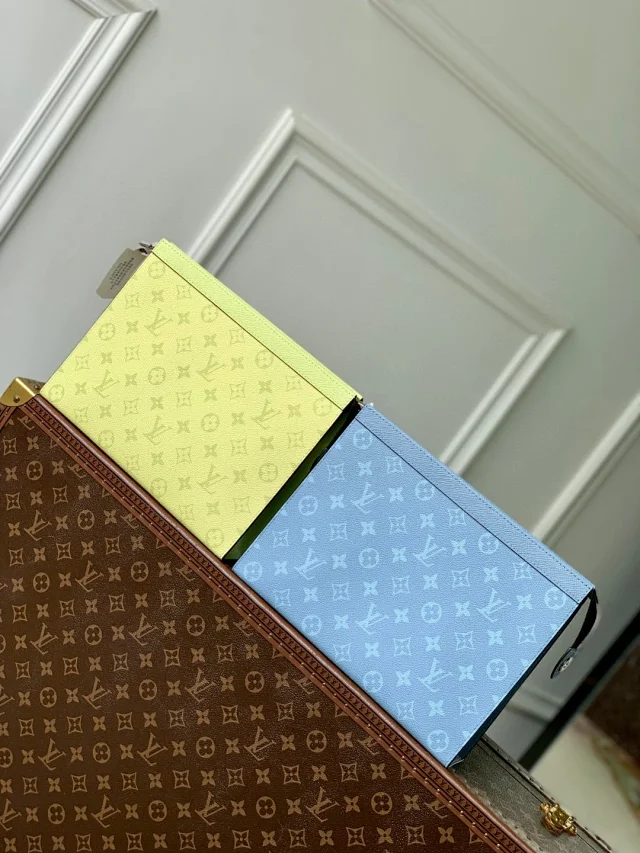 LV Pochette Voyage MM Taigarama leather and Monogram Eclipse canvas