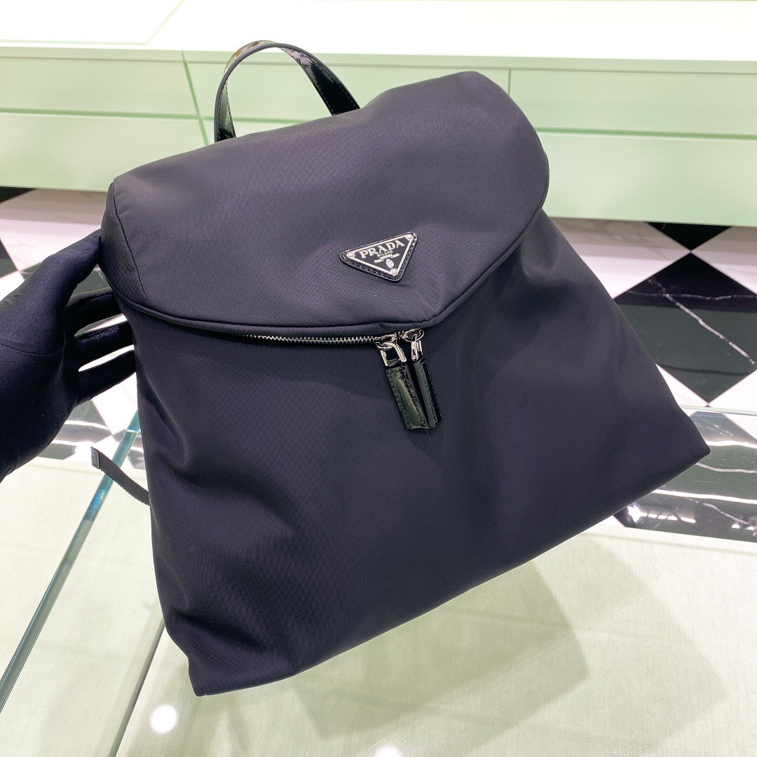 Prada Re-Nylon logo-plaque backpack black