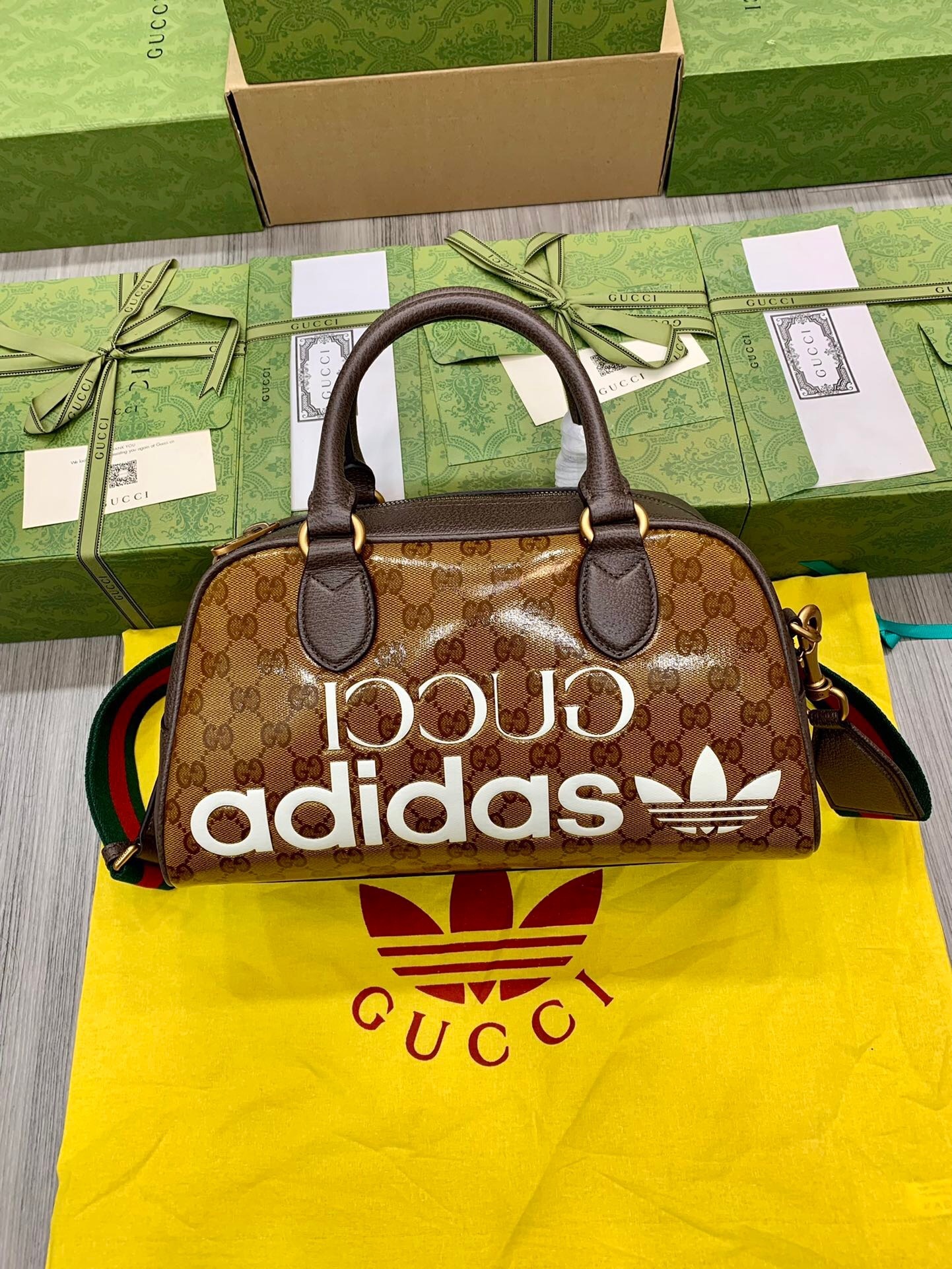 Gucci x adidas Mini Duffle Bag in beige and brown GG crystal canvas with a brown leather trim