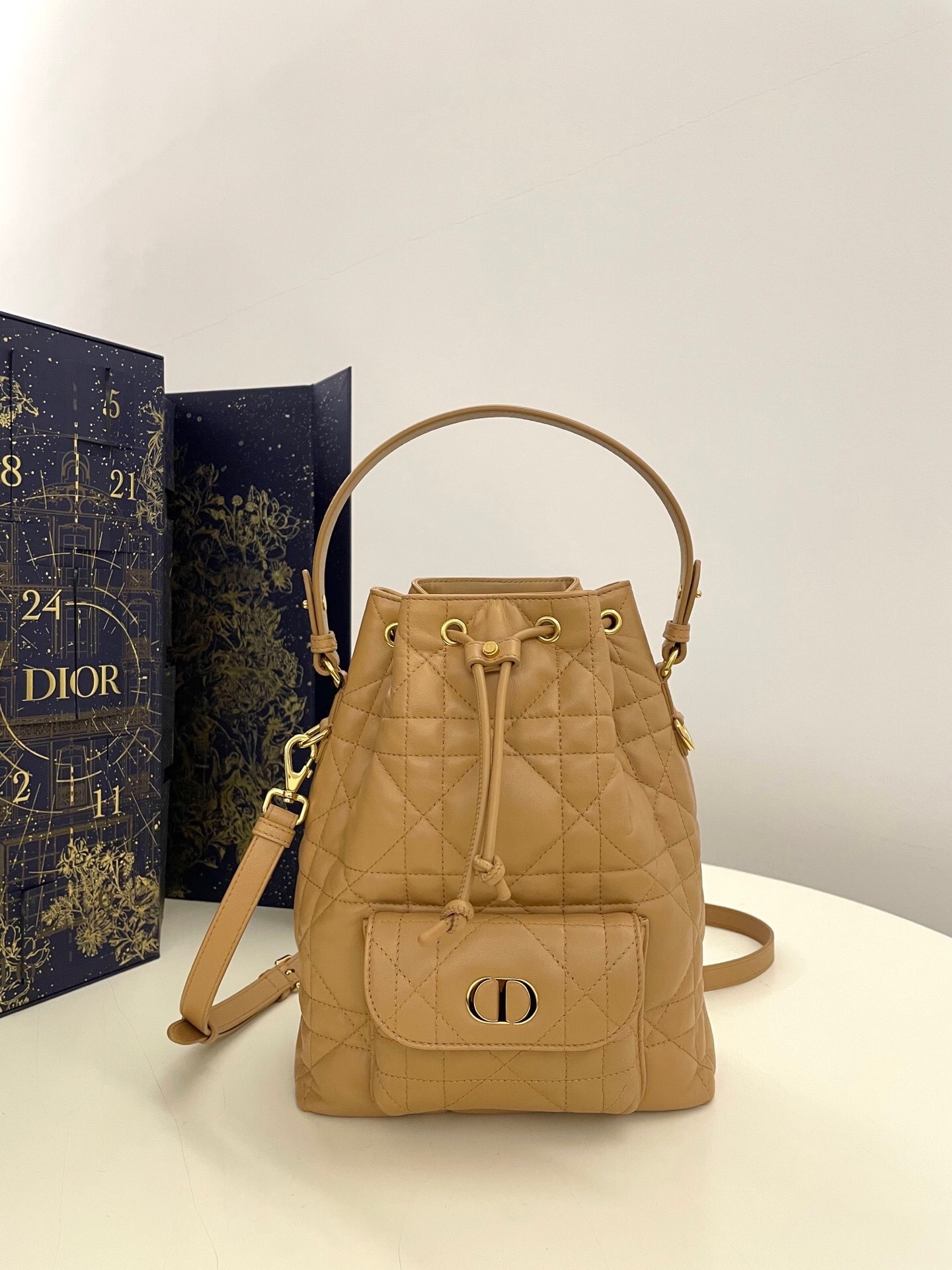 Dior Caro bucket bag beige lambskin Macrocannage topstitching