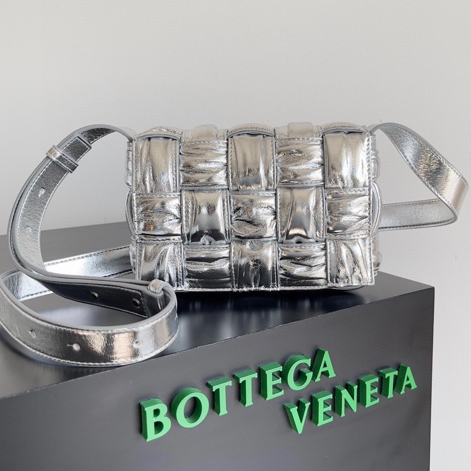 Bottega Veneta Cassette crossbody bag in a silver, woven leather finish