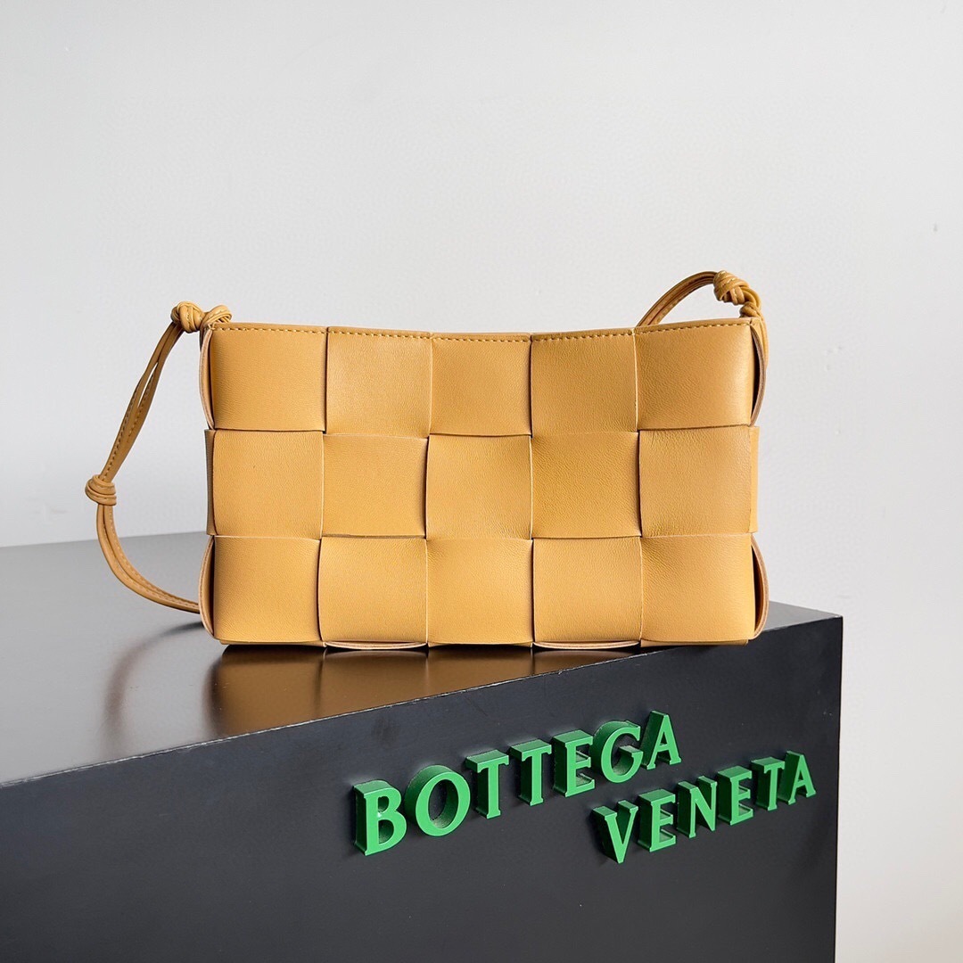 Bottega Veneta Cassette Crossbody Bag in camel-colored intrecciato leather