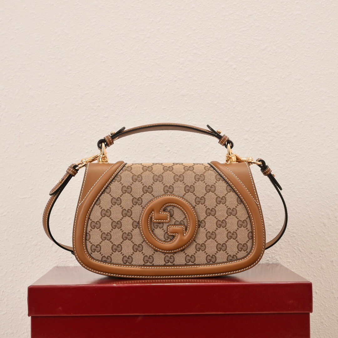 Gucci Blondie Small Top Handle Bag in beige and dark brown Original GG canvas with brown leather trim