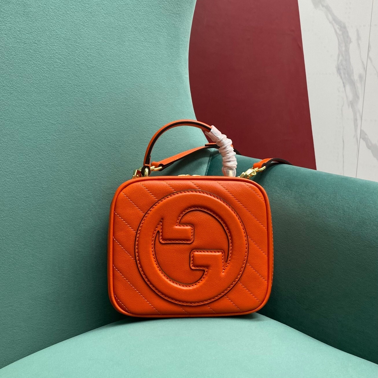 Gucci Blondie Top Handle Bag in orange leather