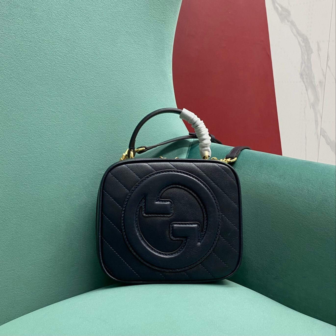 Gucci Blondie Top Handle Bag in black leather