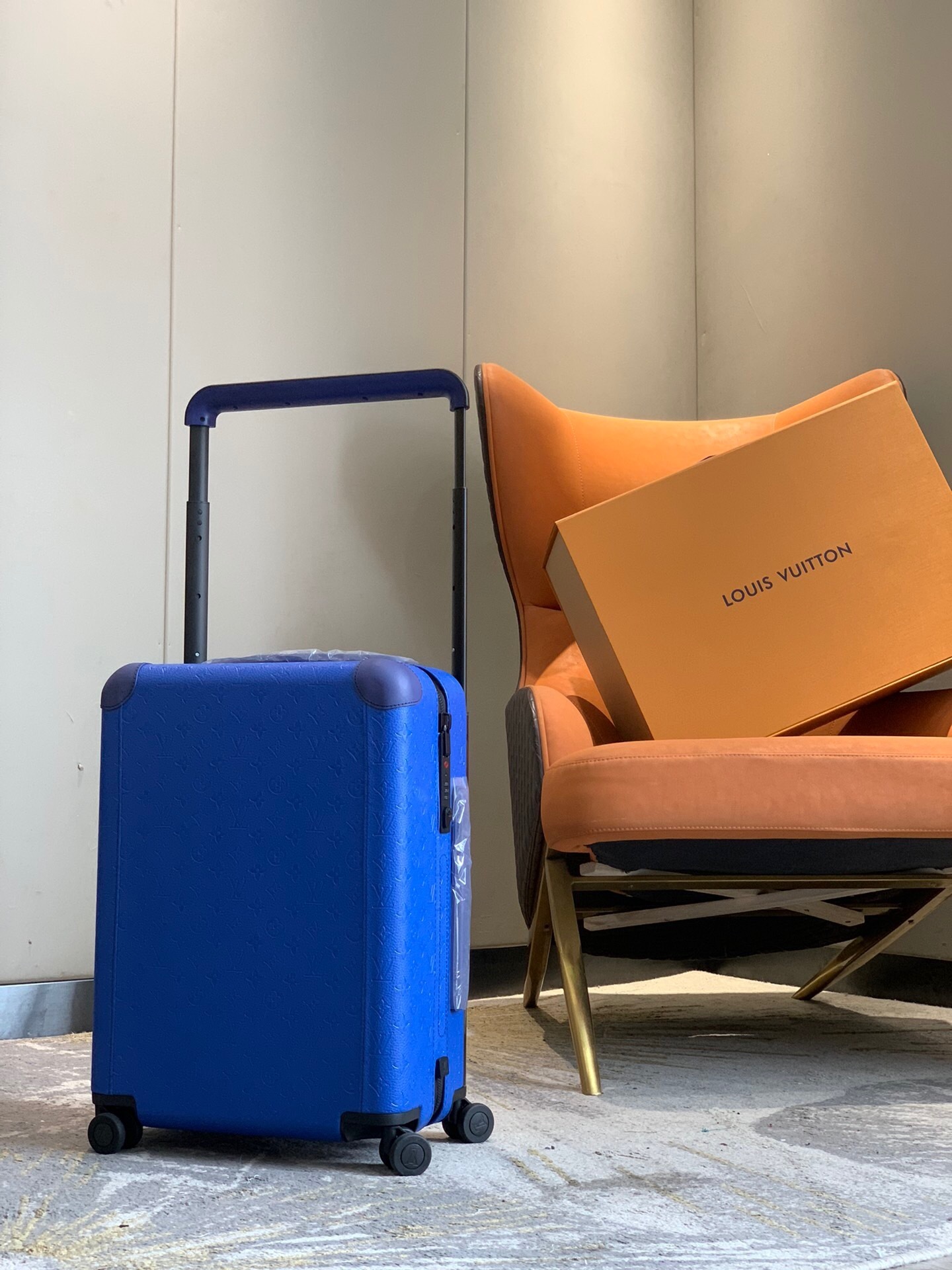 LV blue trolley suitcase