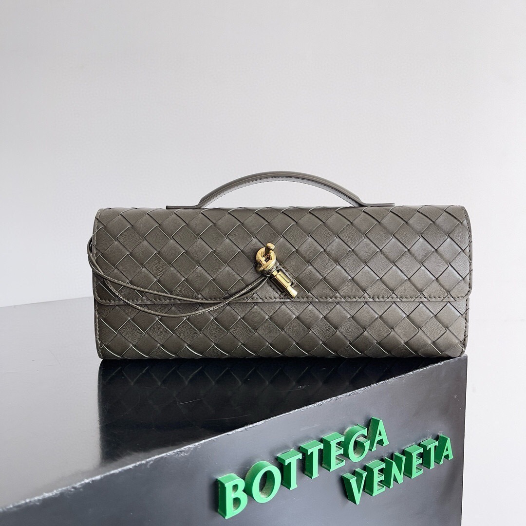 Bottega Veneta Andiamo clutch with a metallic knot closure and a top handle