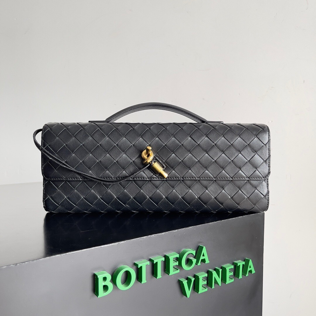 Bottega Veneta Andiamo clutch in Intrecciato leather with a signature knot closure.