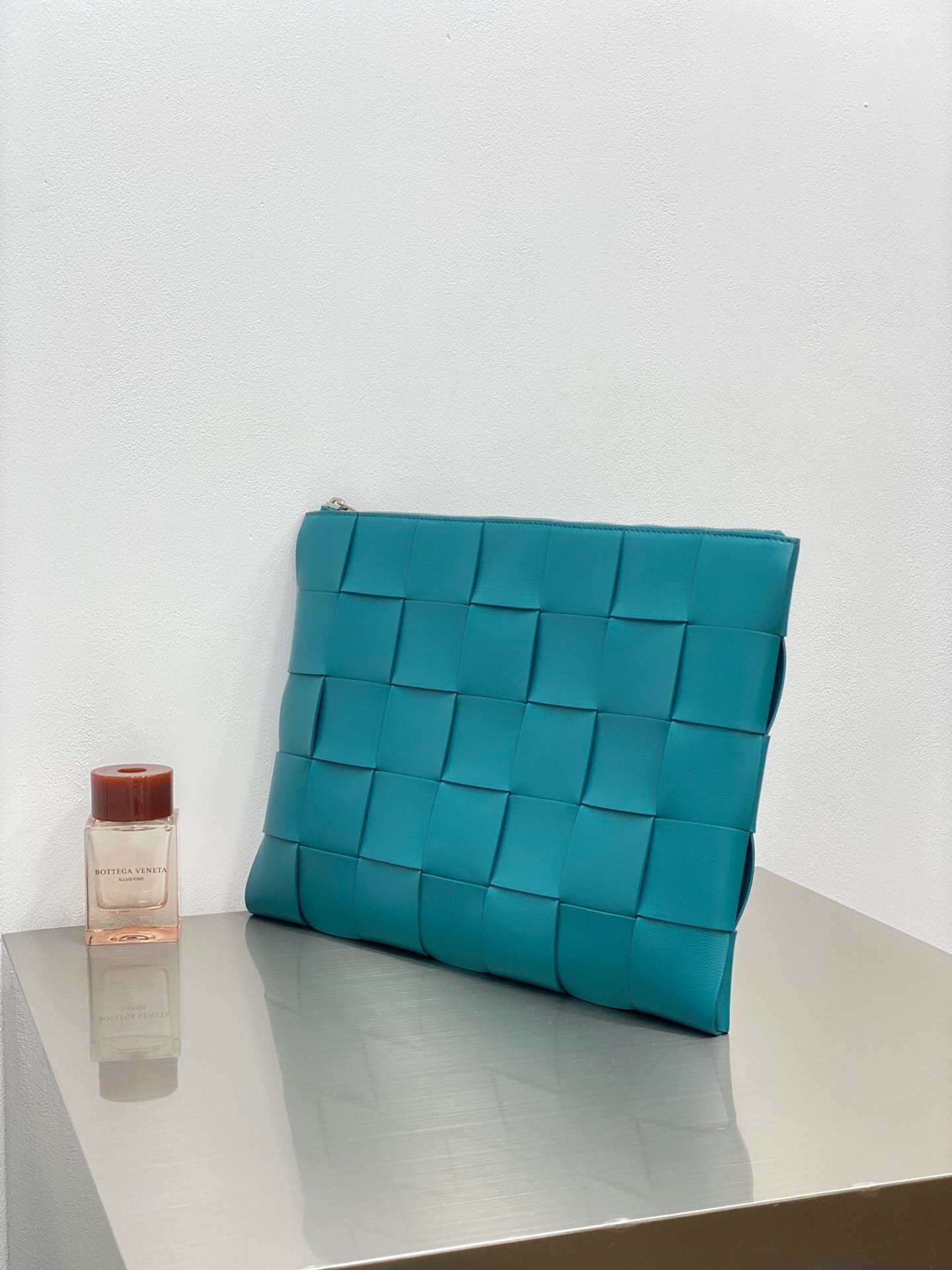 Bottega Veneta Intrecciato leather pouch