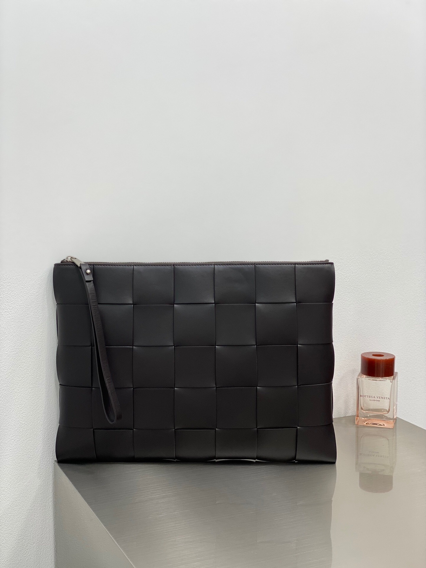 Bottega Veneta Intrecciato leather pouch