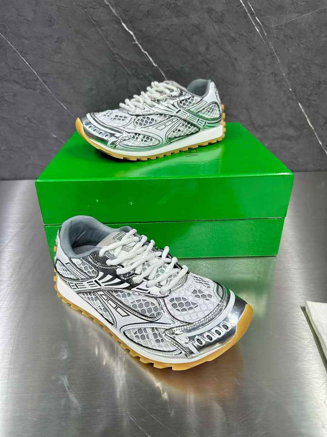 Bottega Veneta Orbit sneaker in silver and white technical fishnet