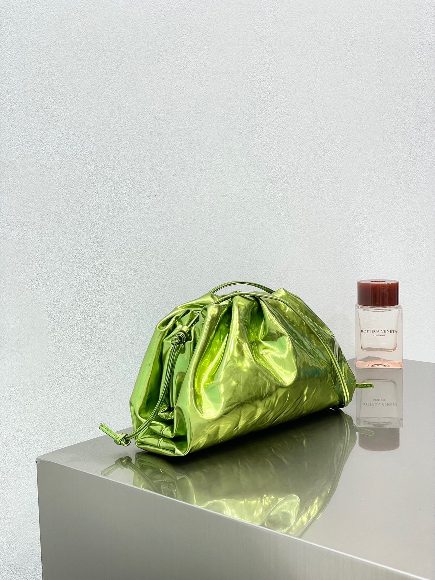 Bottega Veneta The Pouch clutch in metallic crinkled leather