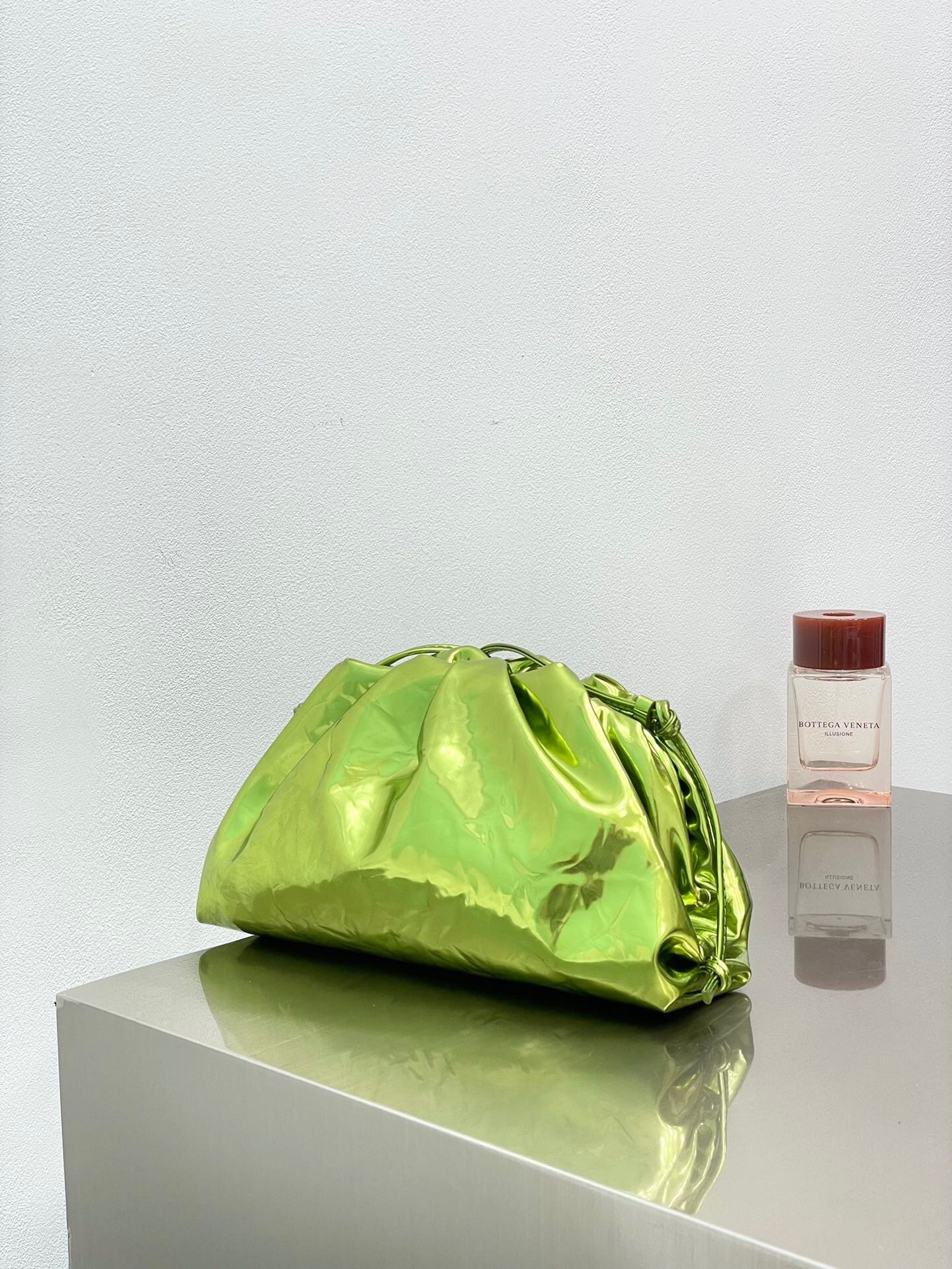 Bottega Veneta The Pouch clutch in metallic crinkled leather