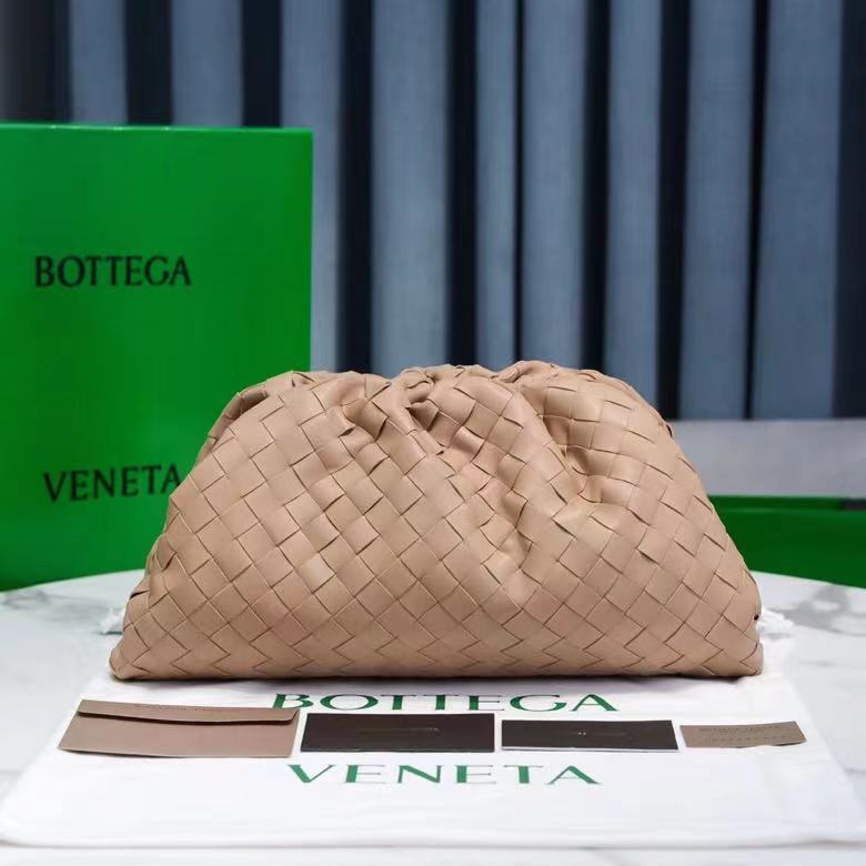 Bottega Veneta The Pouch intrecciato leather clutch in a putty or beige hue