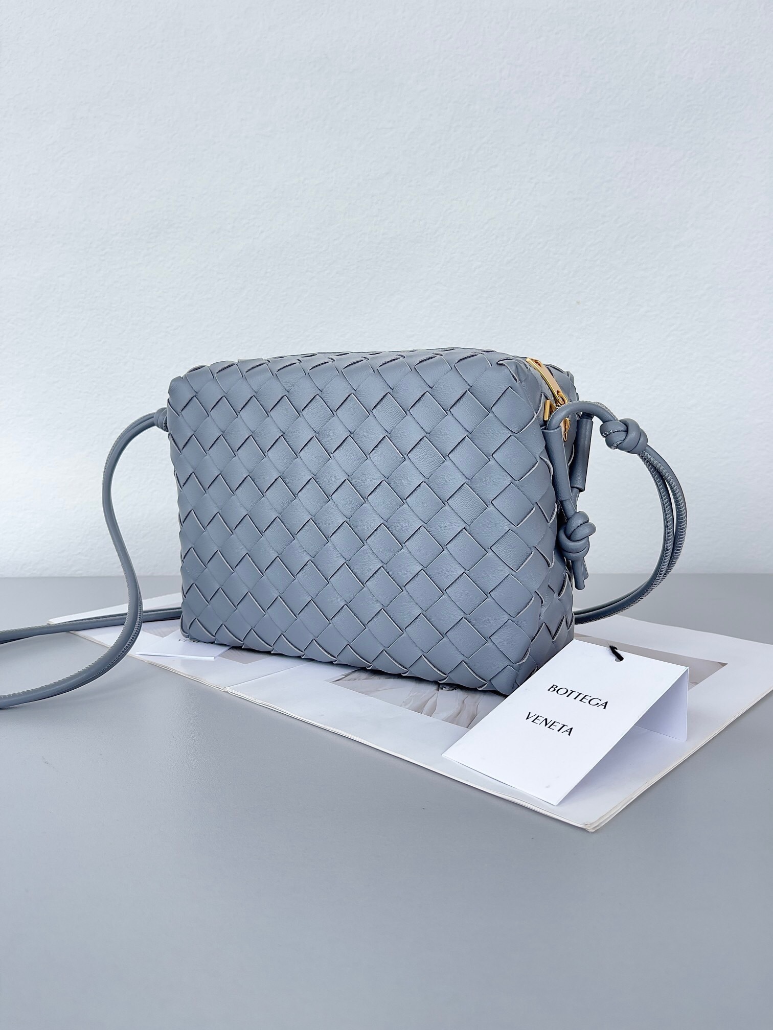 Bottega Veneta Loop Small intrecciato leather crossbody bag grey