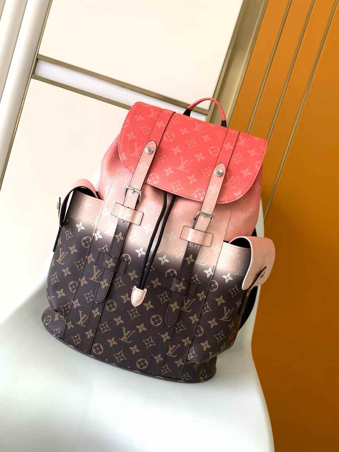LV Christopher Backpack in a pink and brown gradient monogram pattern