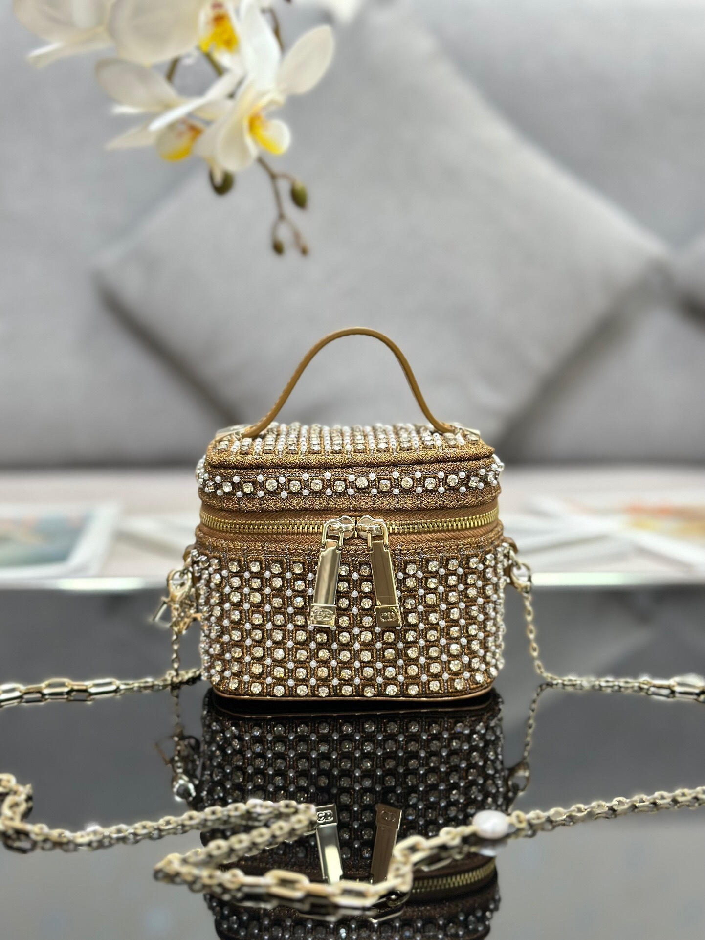 Dior Micro Vanity Case in gold-tone material with pearl and crystal embellishments