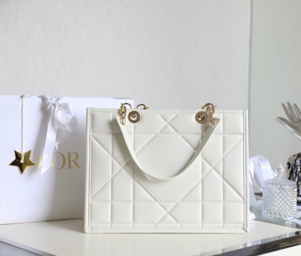 Dior Medium Essential tote bag in white Archicannage calfskin.