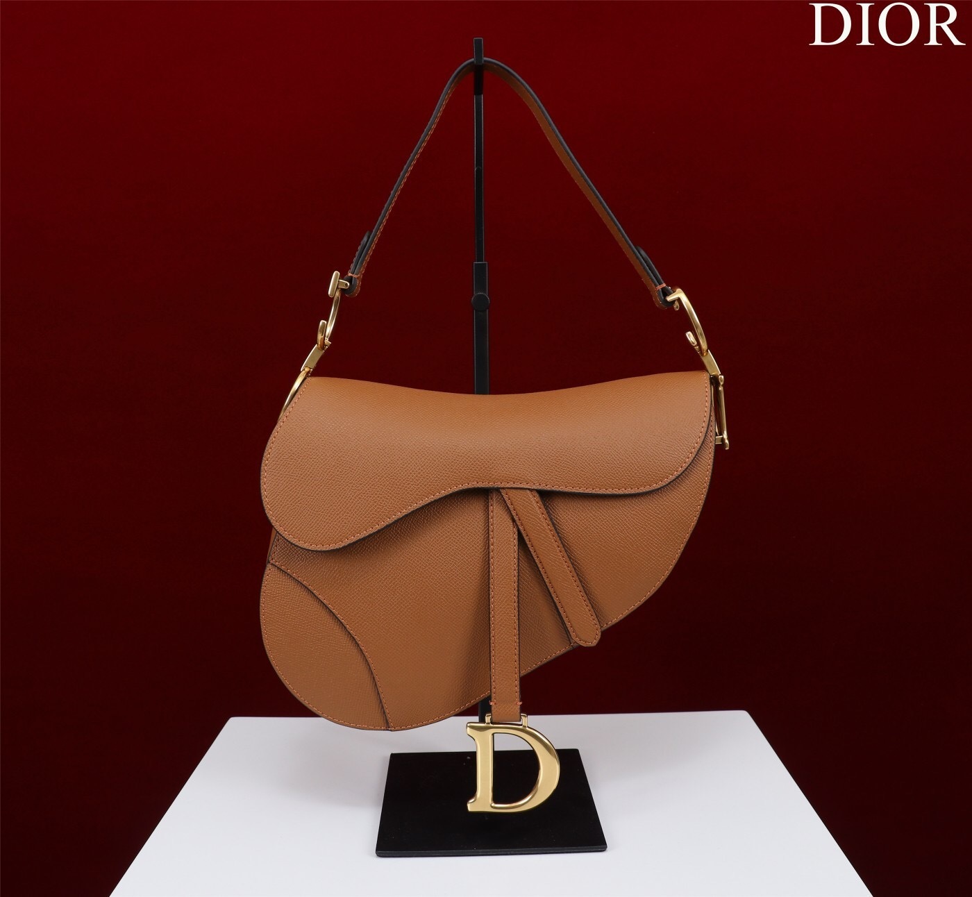 Dior Saddle Bag in tan or brown leather