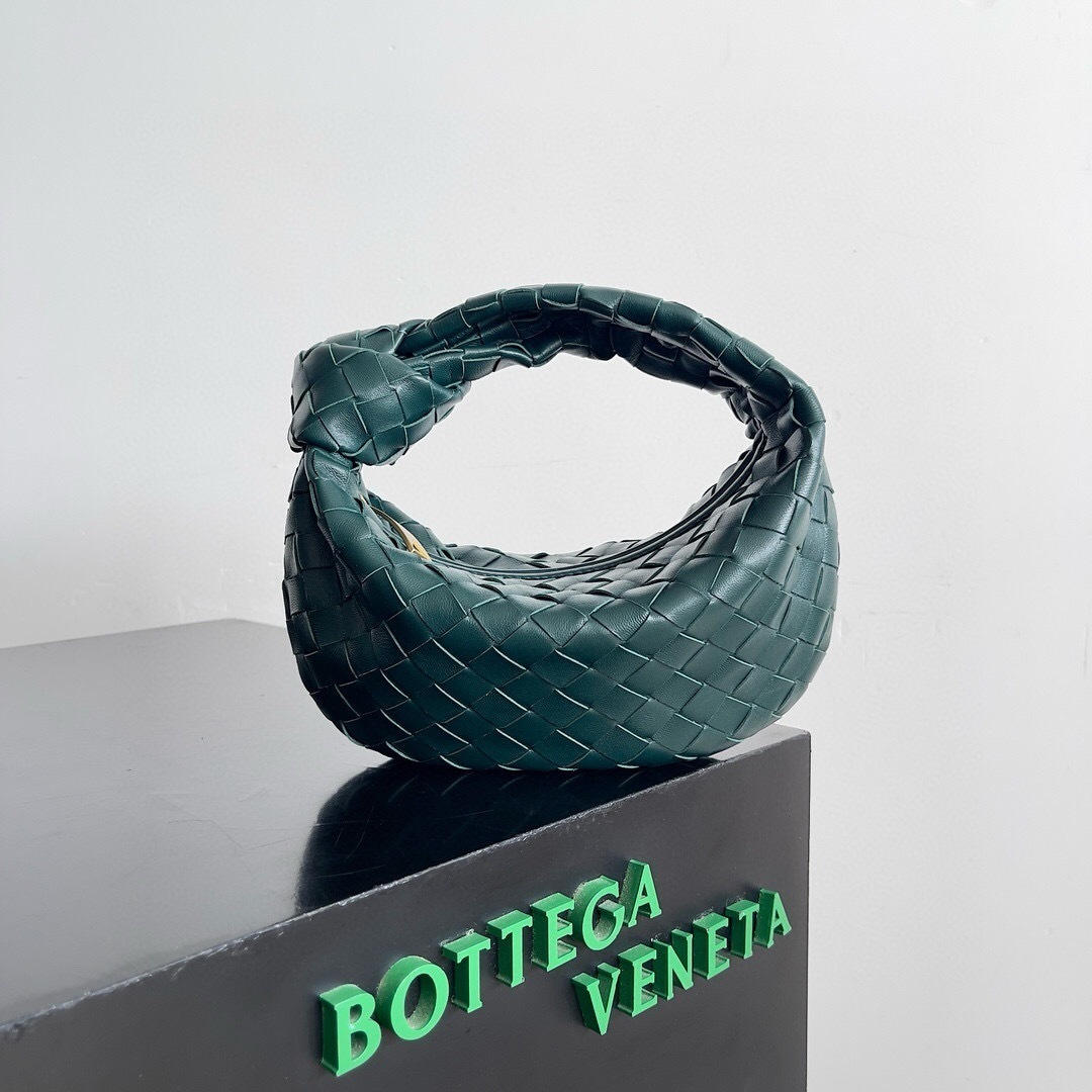 Bottega Veneta Mini Jodie bag in a green, intrecciato woven leather