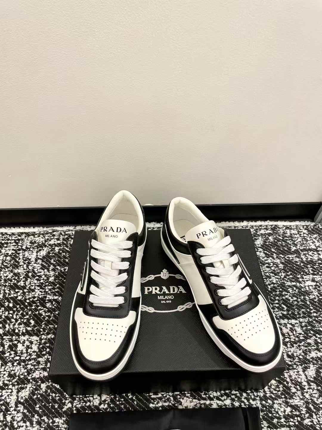 Prada Downtown leather sneakers white and black