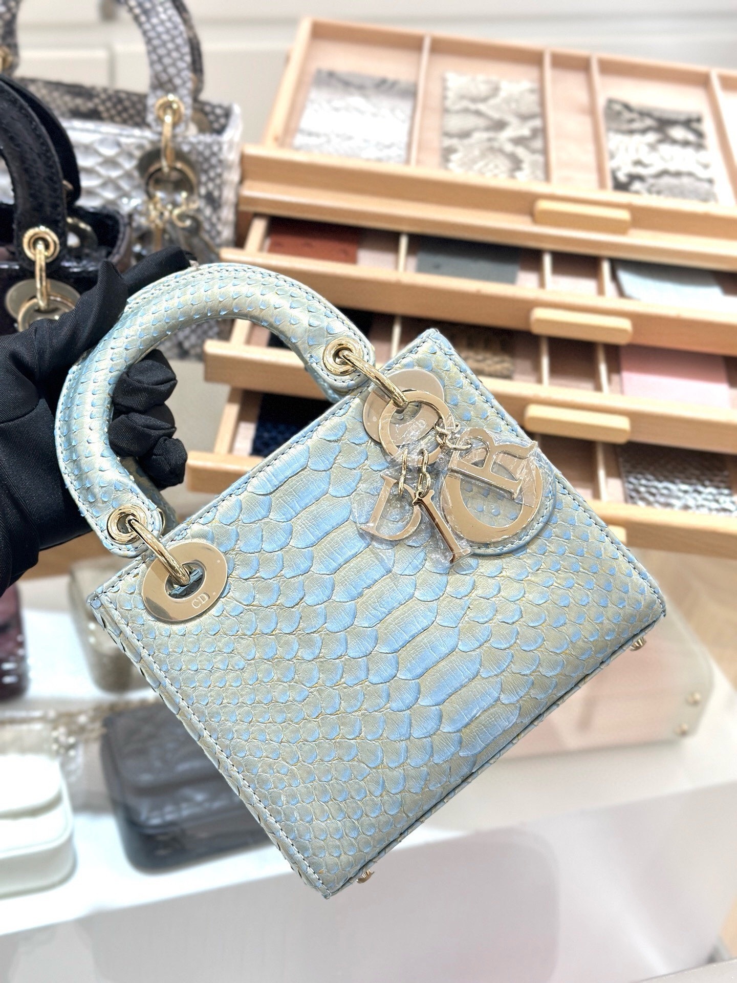 Dior Mini Lady Dior bag in light blue alligator or python leather with light gold hardware
