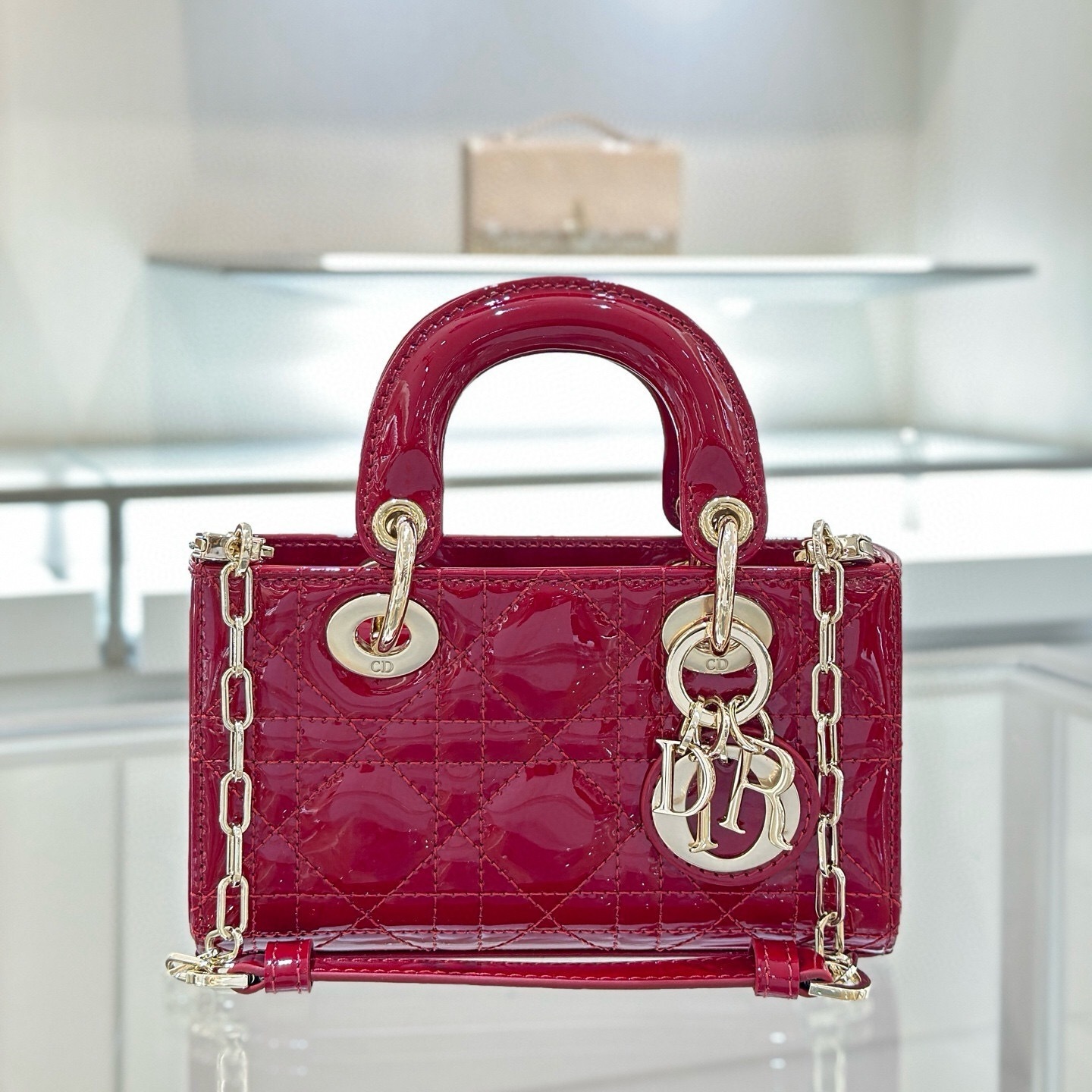 Dior Mini Lady Dior bag in cherry red patent cannage calfskin leather with gold-finish metal