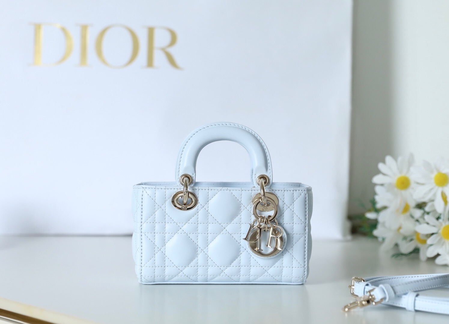 Dior Lady D-Joy bag in pale blue lambskin with Cannage stitching and pale gold-finish metal