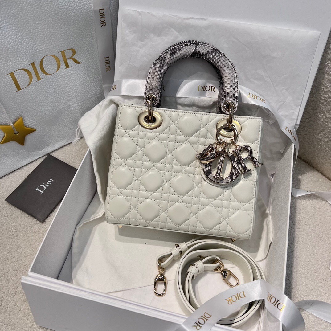 Dior Lady Dior bag in white leather with a contrasting lizard-skin handle