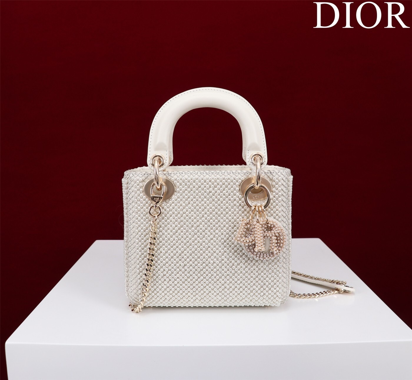 Christian Dior Lady Dior micro bag in latte lambskin with Cannage topstitching and resin pearl detailing