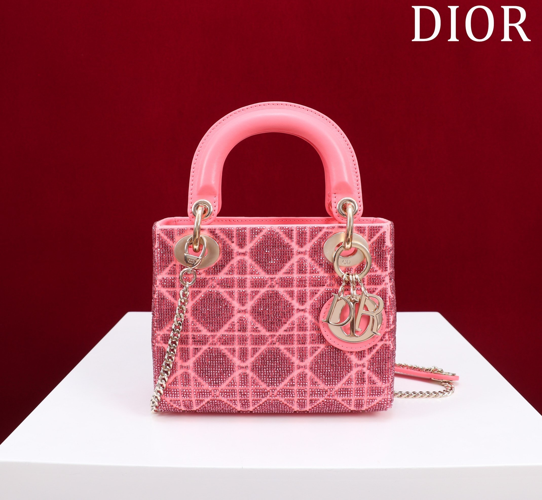 Christian Dior Lady Dior Chain Bag in pink cannage beaded satin with metallic leather.