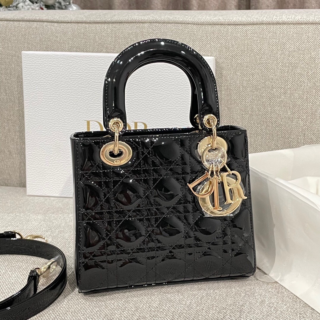 Christian Dior Lady Dior Mini bag in black patent leather.