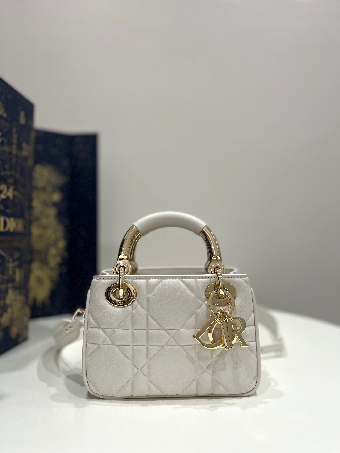 Dior Lady 95.22 bag in latte lambskin with Cannage topstitching and pale gold-finish metal