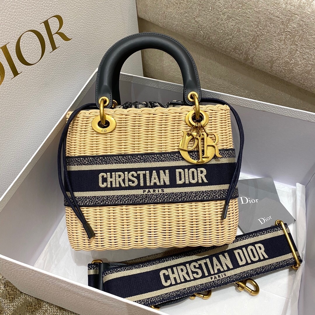Dior Medium Lady Dior bag in natural rattan with a blue Dior Oblique jacquard interior pouch and embroidered band.