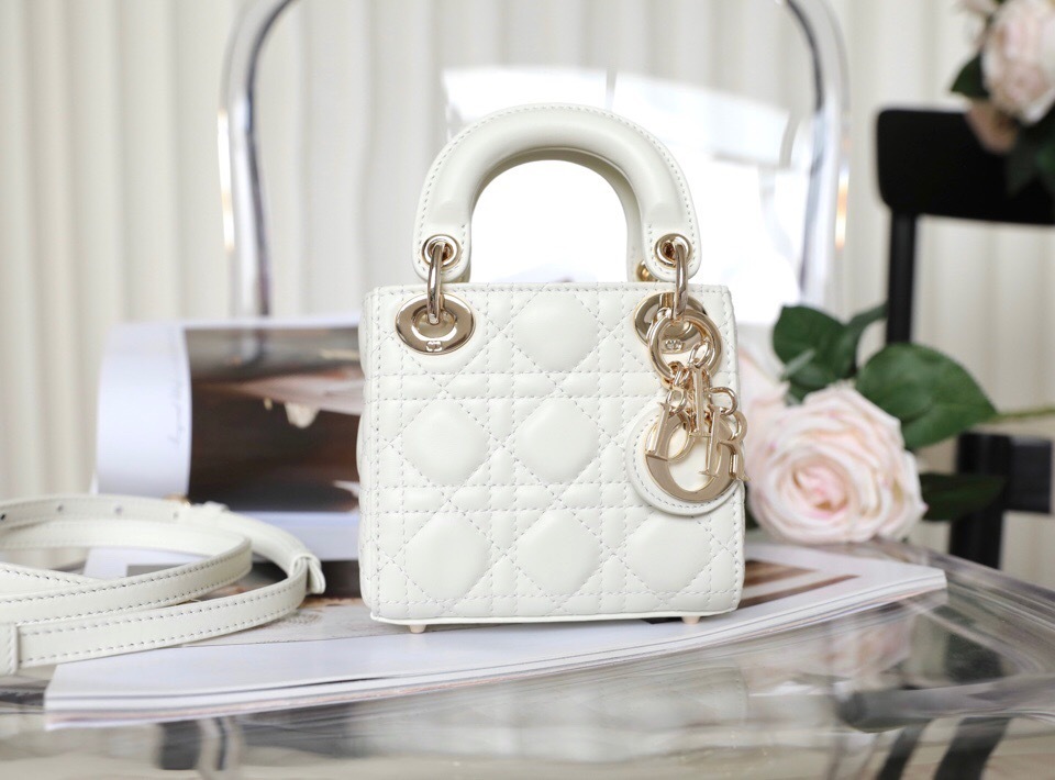 Dior Lady Dior bag in white lambskin with Cannage stitching and gold-finish metal