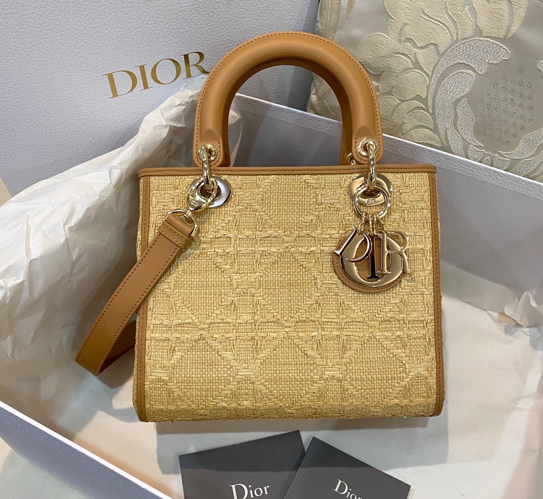 Dior Lady Dior bag crafted from natural raffia with the iconic Cannage motif